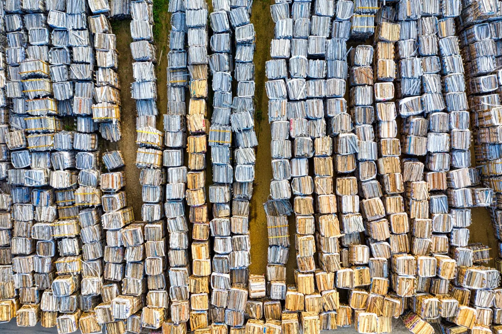 Organized stacks of compressed waste-paper bales