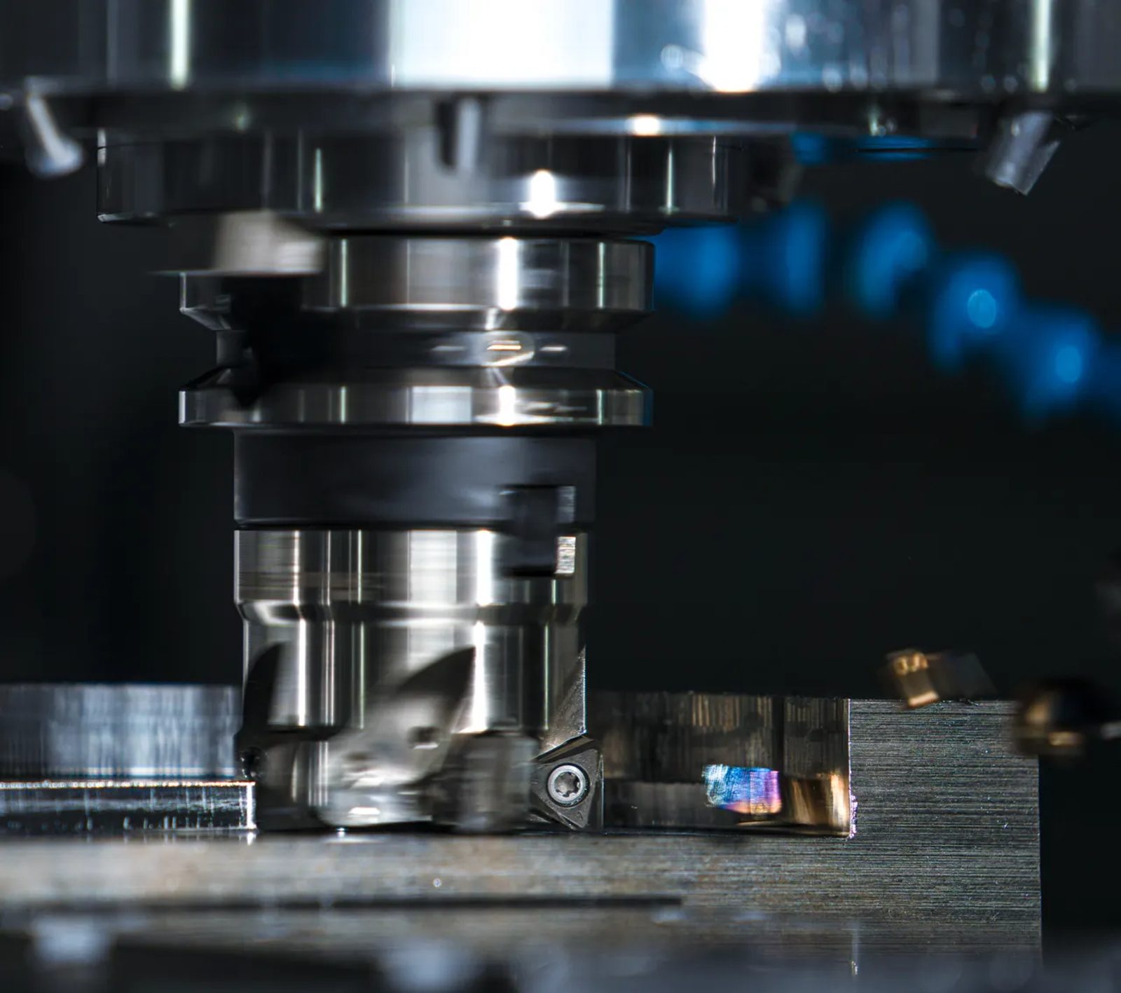 A metalworking machine cutting a workpiece